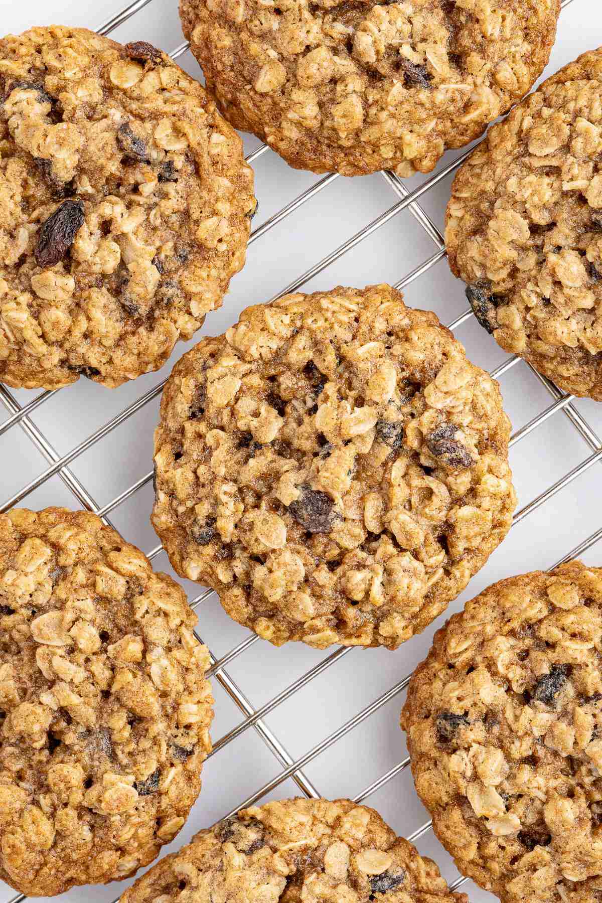 cooling tray with several oatmeal raisin cookies