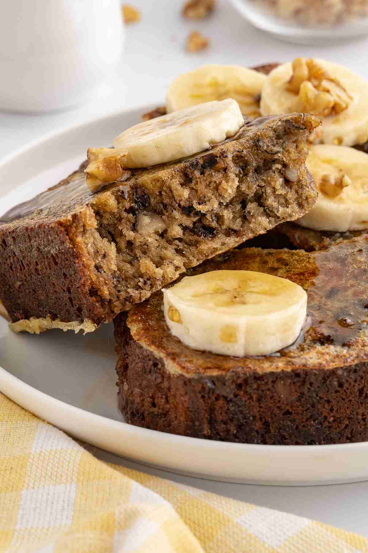 a slice of banana bread french toast showing inside texture