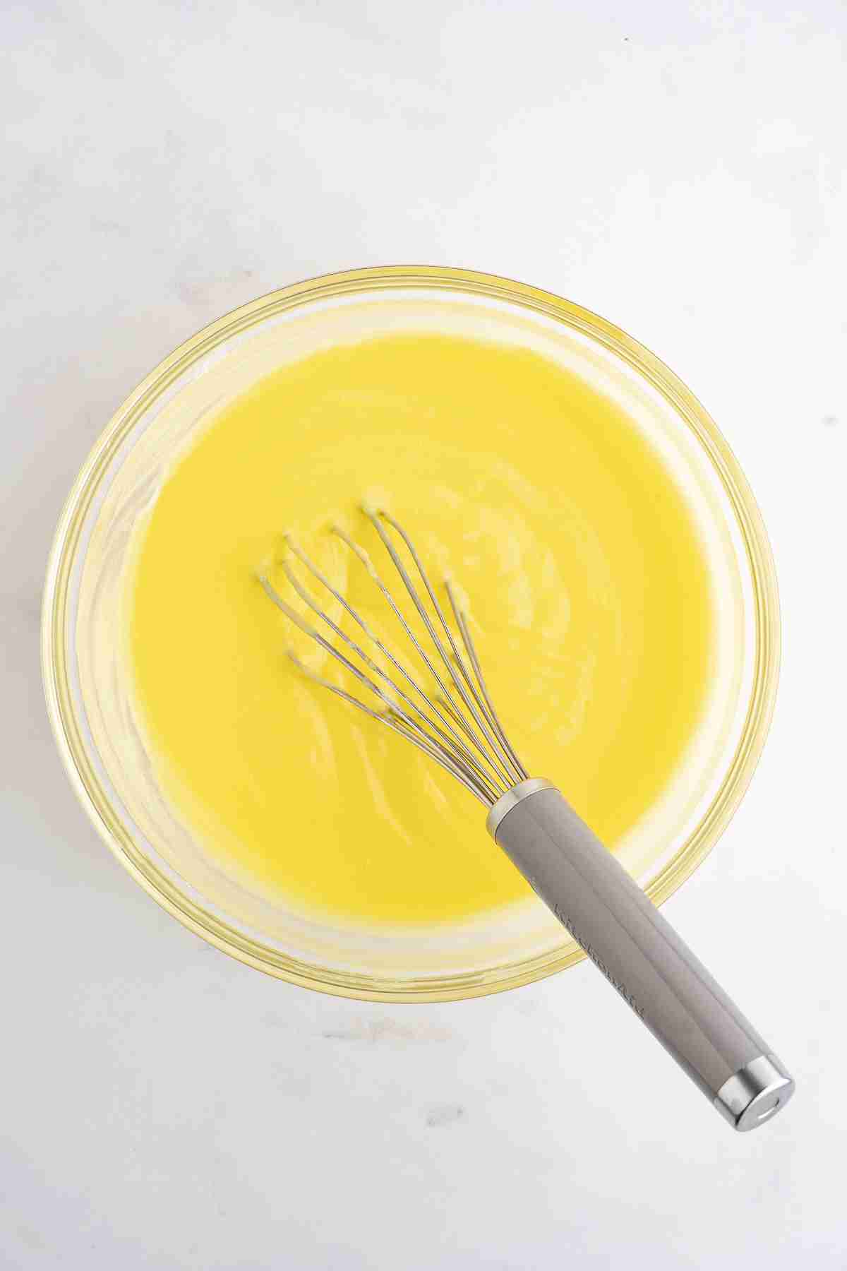 mixing bowl with lemon pudding for lemon lush no bake dessert