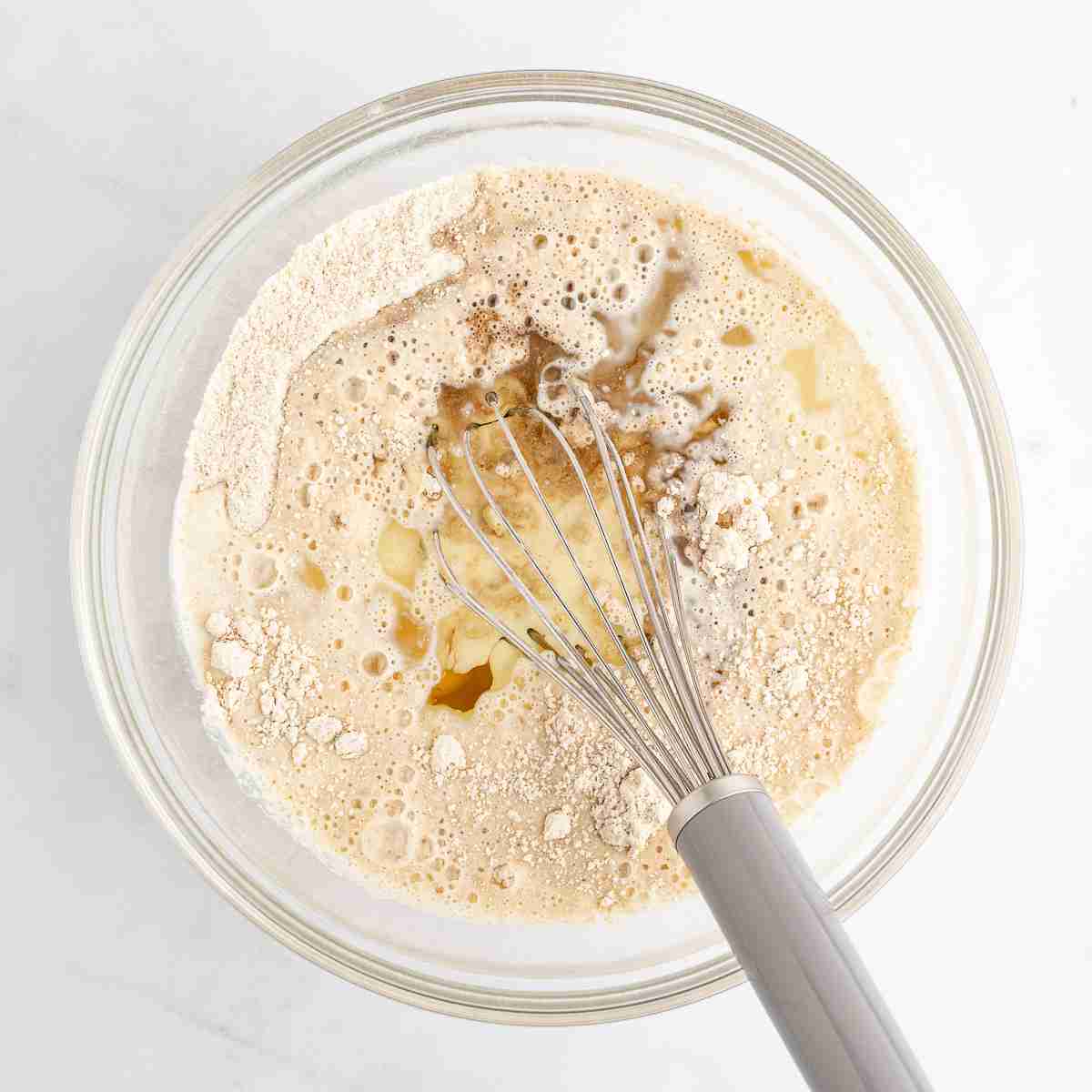 mixing bowl with wet ingredients added for fresh milled flour waffles