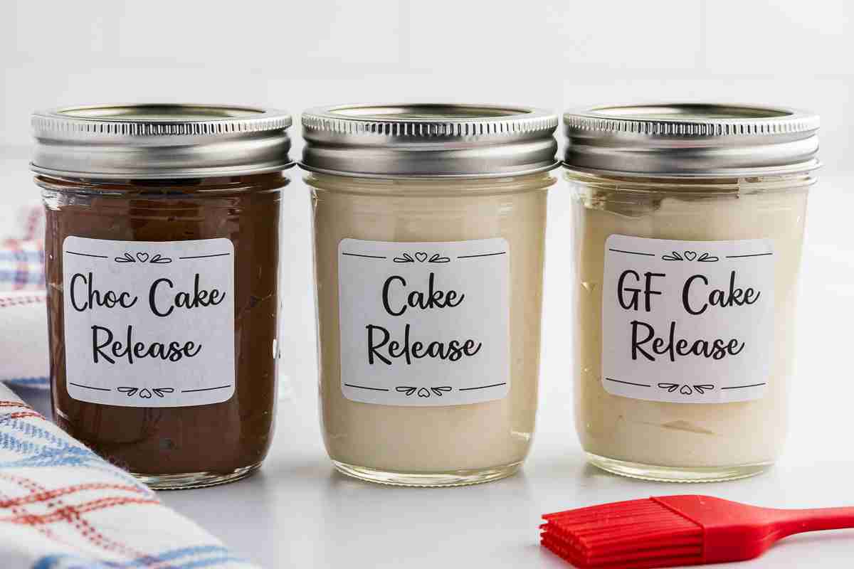 three jars of cake release ready for storing with labels choc cake release cake release and gf cake release